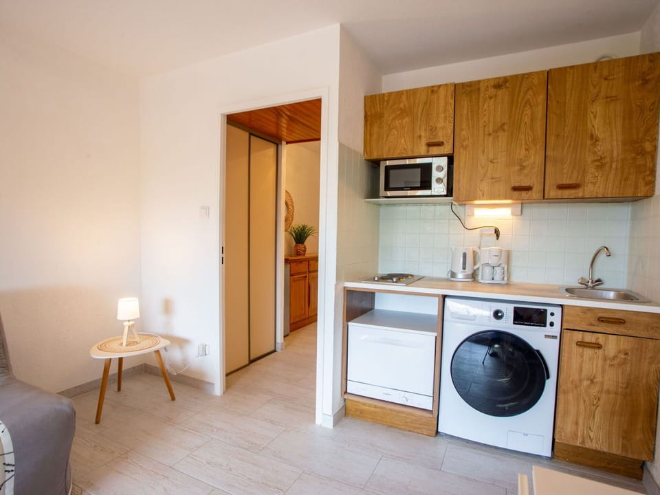 Cabinetry, Property, Furniture, Sink, Kitchen Sink, Countertop, Tap, Plumbing Fixture, Kitchen Appliance, Wood