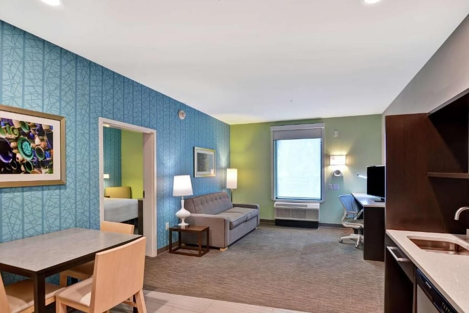 Spread out in a spacious suite with sofa and dining nook.