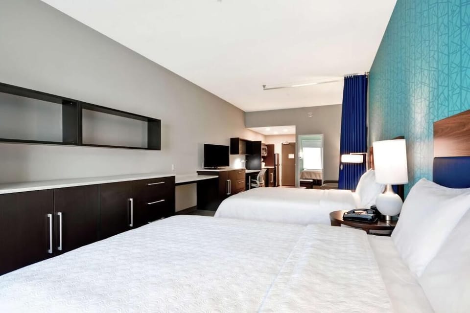 Stretch out comfortably with generous space and sleek built-ins.