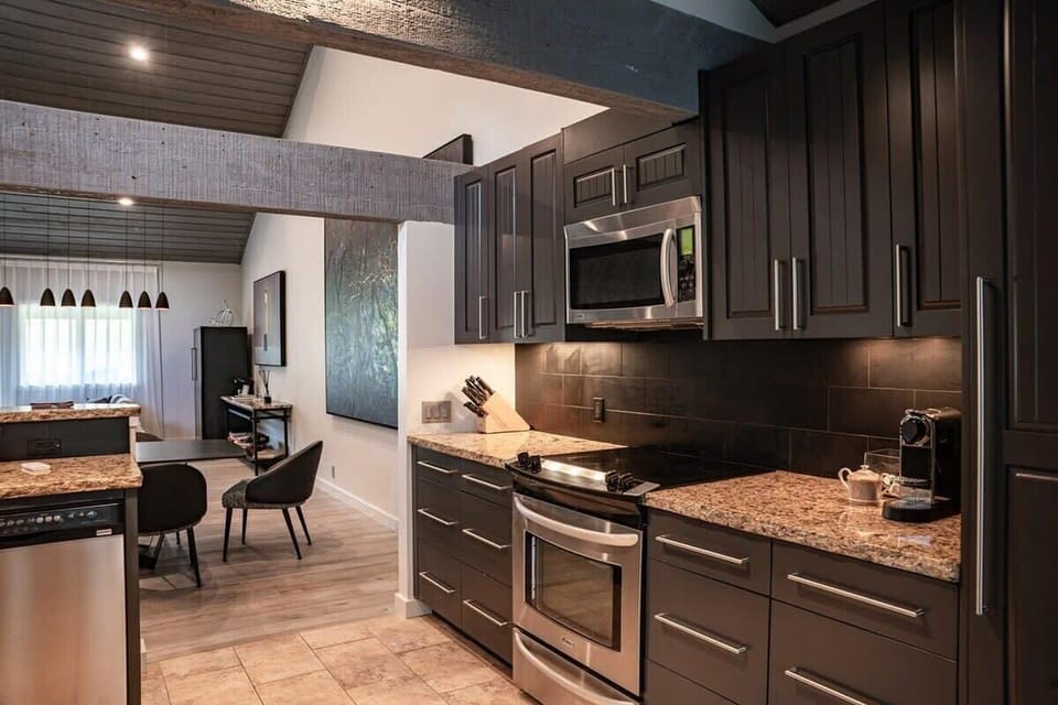 Kitchen: Whip up a feast in our kitchen, decked out with stainless steel appliances, a full stove, and a microwave, all ready for you!