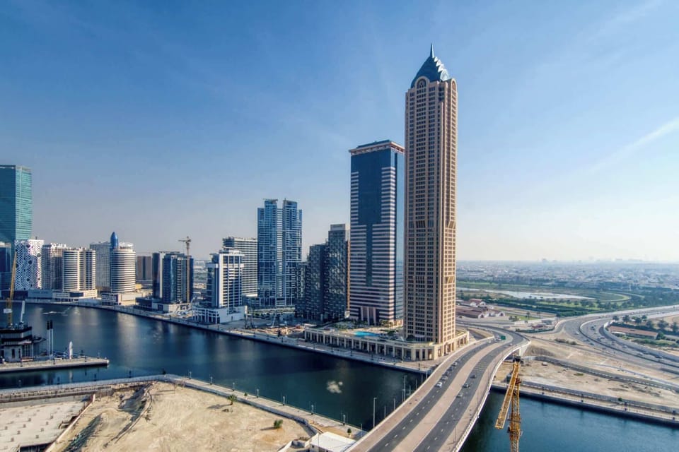 Enjoy city life with beautiful skyline views in this stylish high-rise apartment. It offers modern comfort near the waterfront with easy access to shops, dining, and city energy.