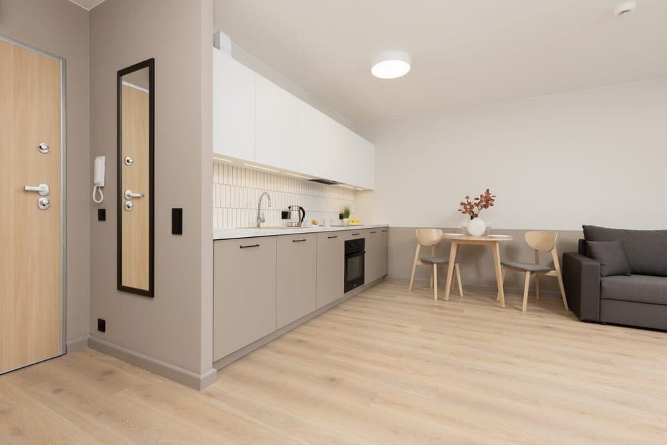 Functional living room with kitchenette.