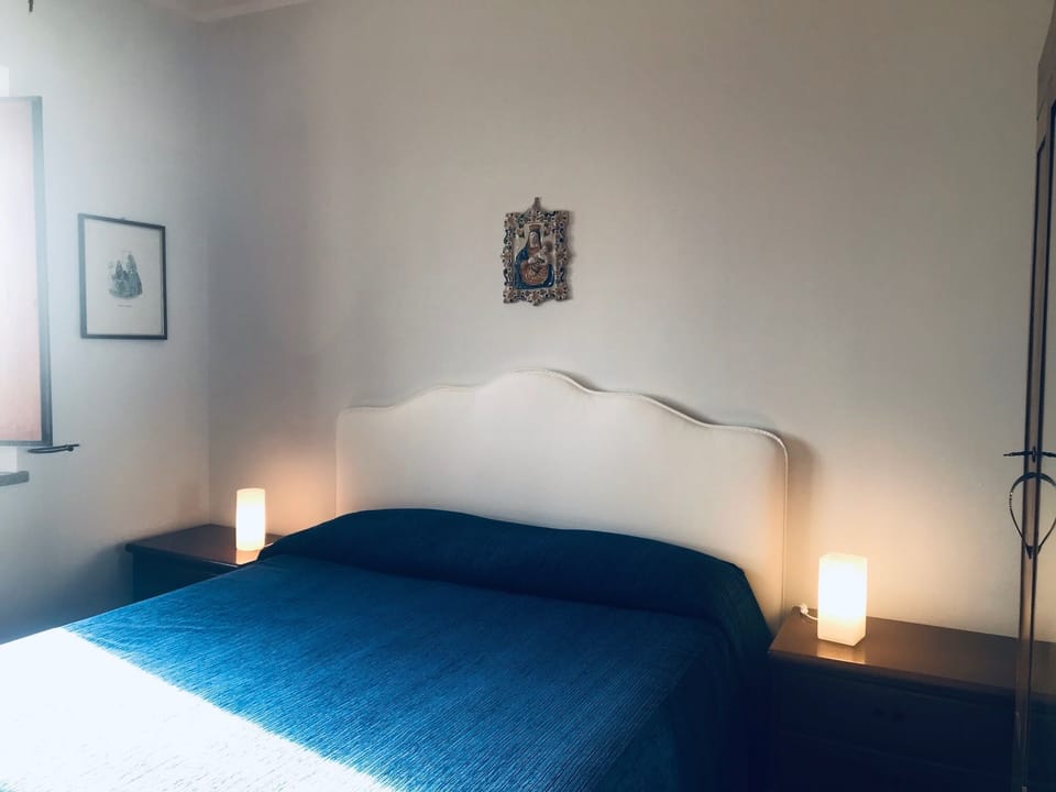 The double room look toward the  garden and swimming pool fenced