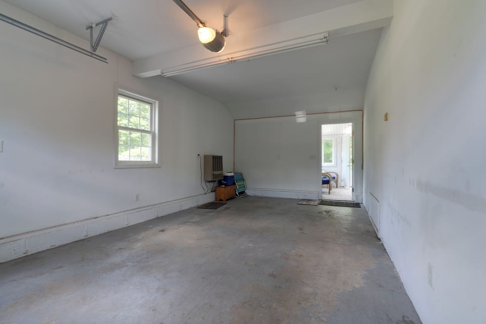 One car garage...private to Unit A.
The open door leads to the SHARED enclosed porch area