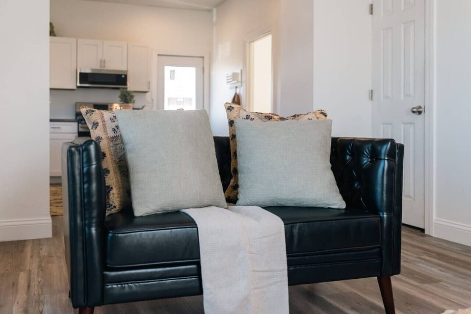 Relax in style with this comfortable and elegant seating area, perfect for any occasion.