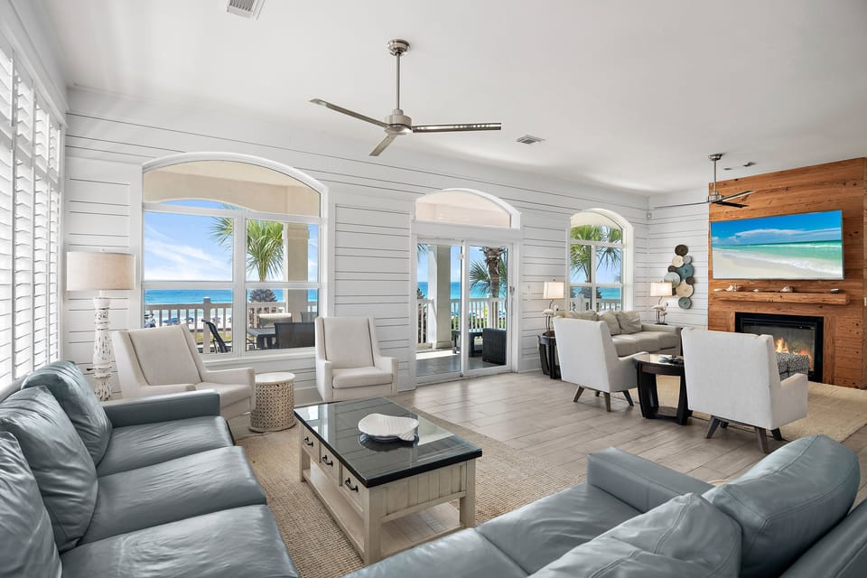 The Living Room features tons of comfortable seating, all new leather furniture, situated around a large Smart TV with incredible Gulf views - Come and Relax!