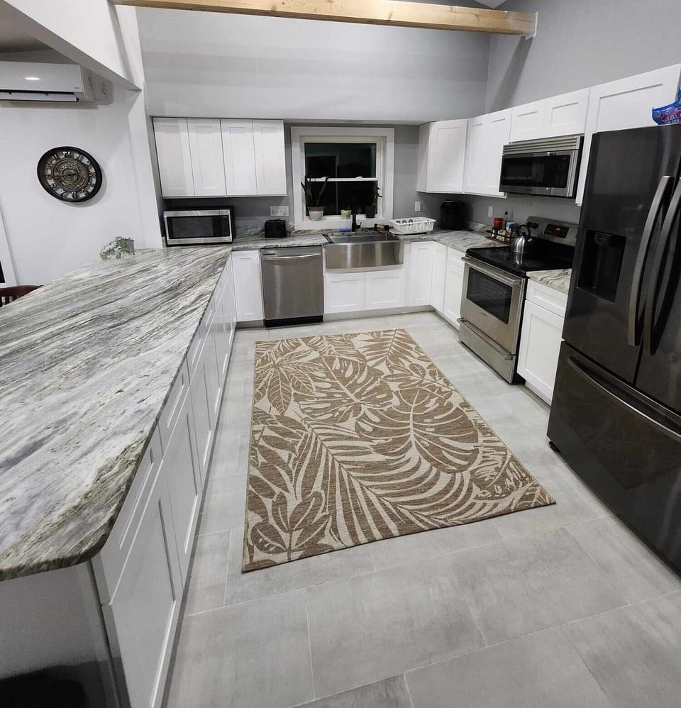 Full stocked kitchen with pots, pans, Keurig, etc.