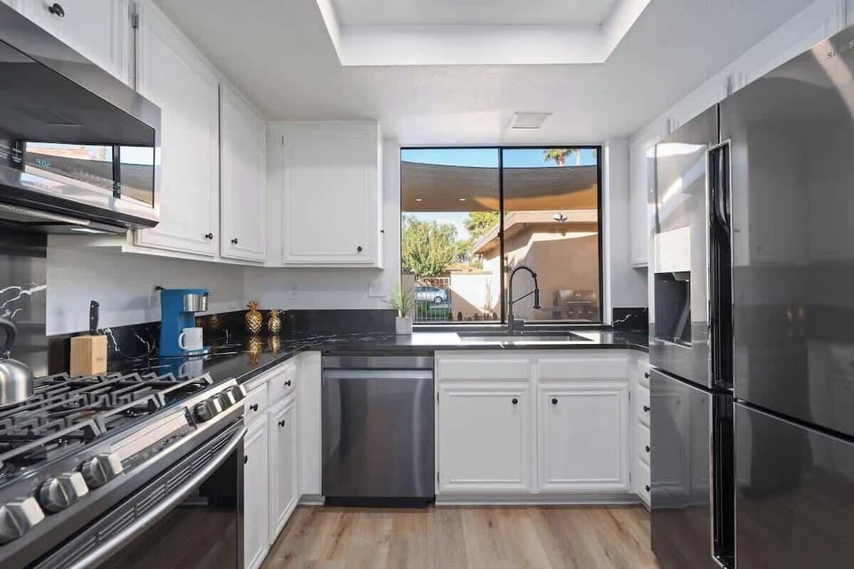 The equipped kitchen is ready for you to whip up your favorite dish!
