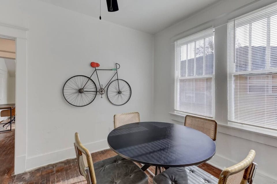 A charming space to unwind and enjoy a meal, with a modern, artistic flair.