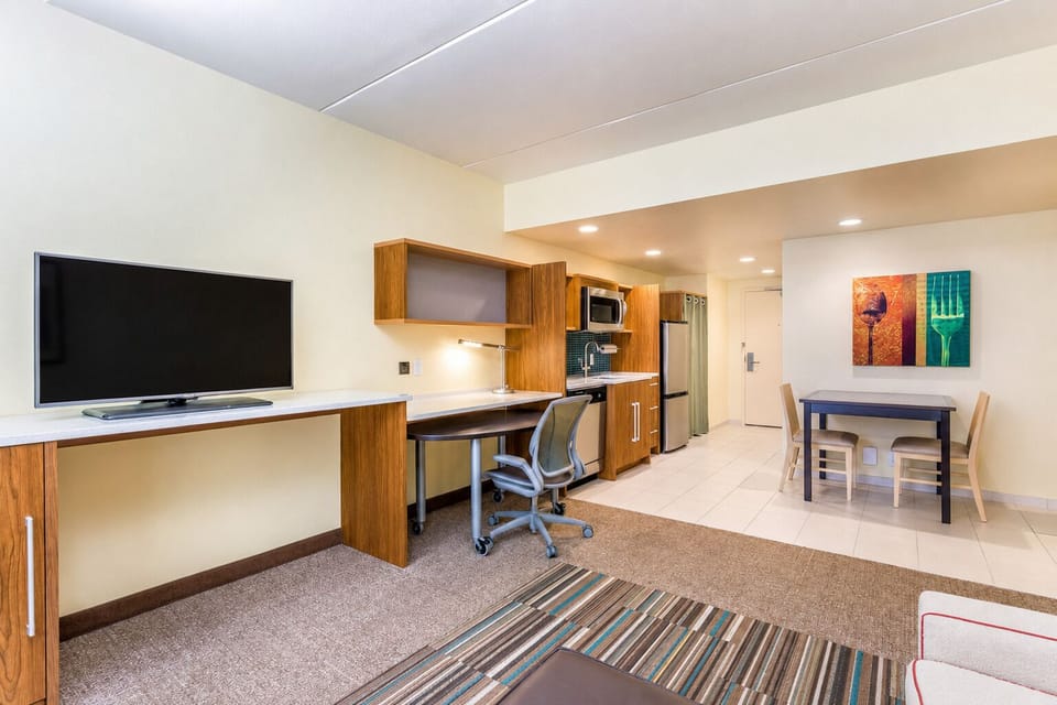 Stream your favorites and spread out at the roomy desk.