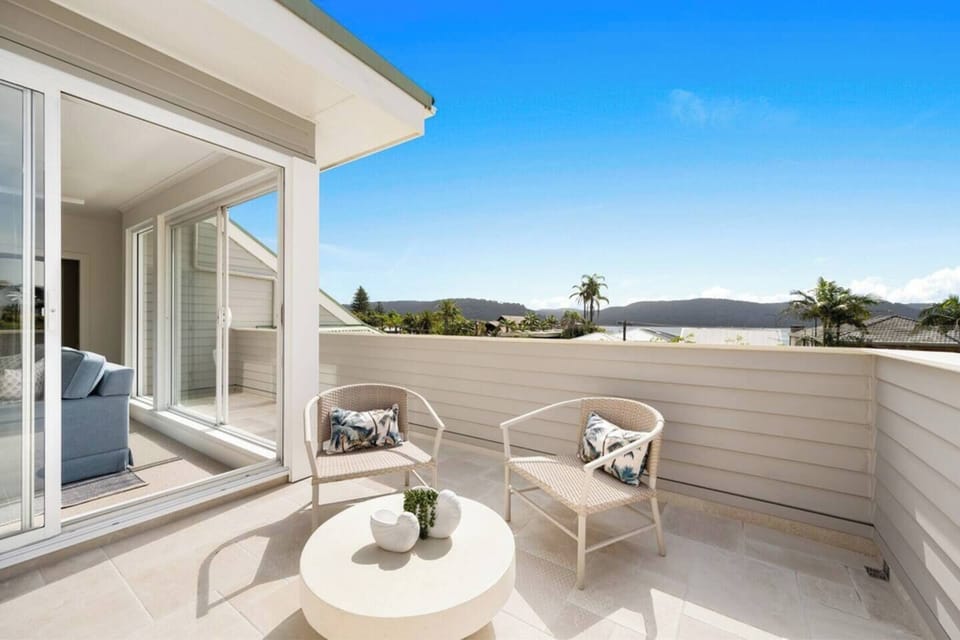 The loft balcony adjoins the primary bedroom, perfect for a quiet sitting spot in the sunshine with a good book. 
