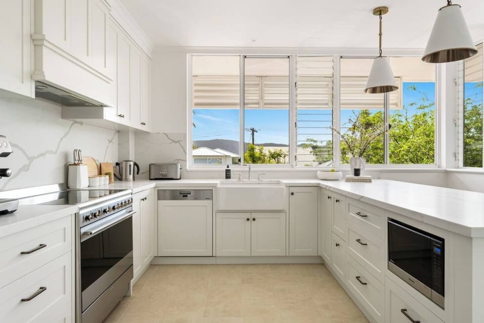 Enjoy your morning brew in the kitchen with the espresso machine. Utilise the modern appliances to cook your favourite meals plus the convenience of generous cabinet storage. 

