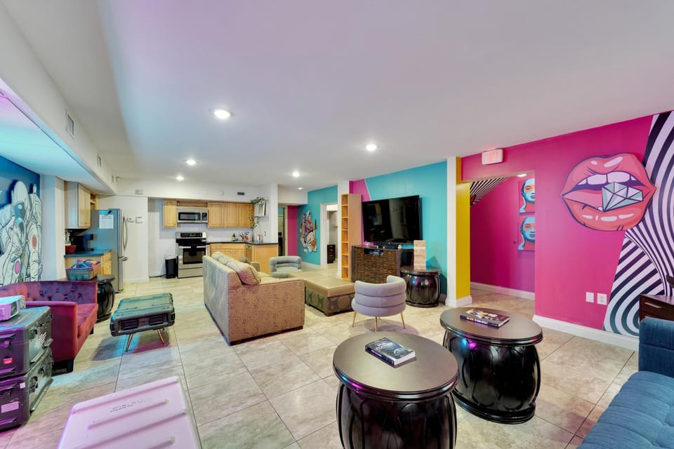 Living room with smart tv and couch seating