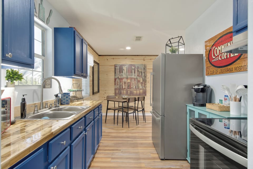 Kitchen includes all cooking and baking items, a few seasonings, coffee, a fridge/freezer & stove. 