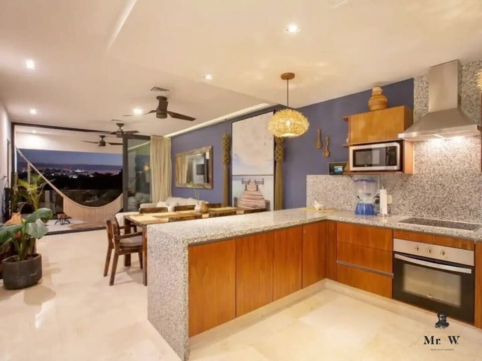 Prepare meals in your spacious, equipped kitchen.