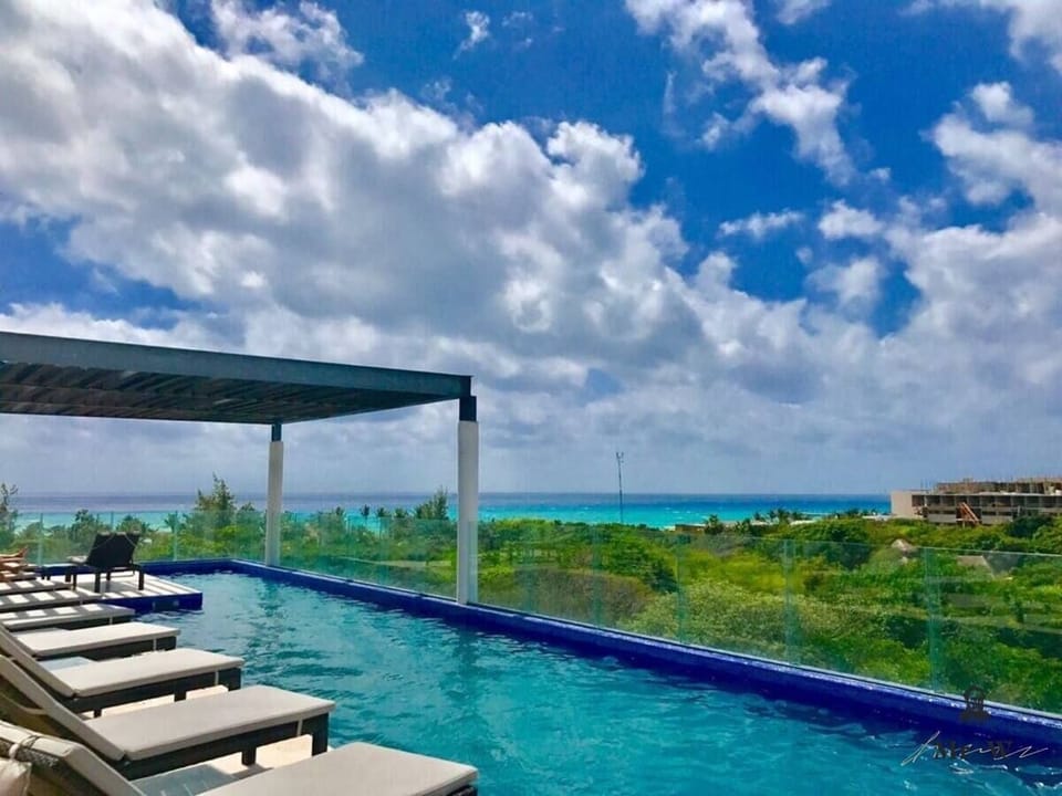 Soak up the sun by the beautiful rooftop pool.