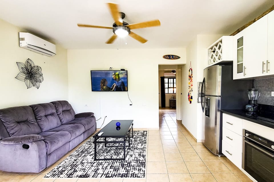 Living room with big TV with worldwide channels