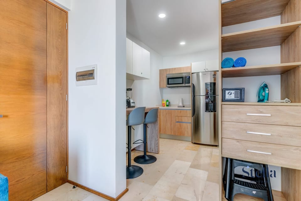 The breakfast bar also serves as a laptop-friendly workspace