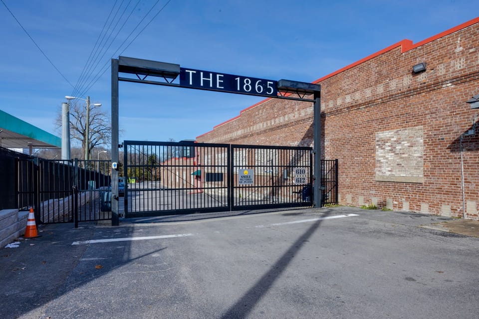 Behold the enchanting allure of this historic brick edifice, exuding a sense of grandeur that transports you to a bygone era