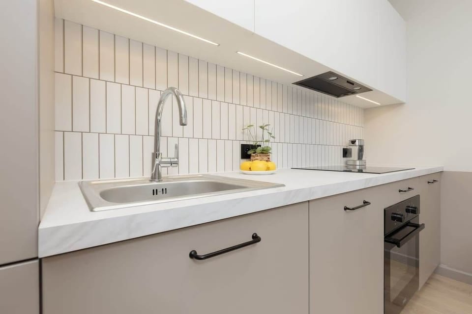 Fully equipped kitchenette with an oven.