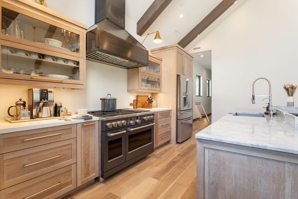 Chefs' kitchen:  GE Cafe Appliances, Caraway ceramic cookware, Culligan RO water filter, Wolf warming drawer & built in microwave