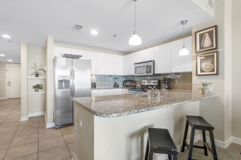 Modern kitchen with granite countertops and stainless steel appliances