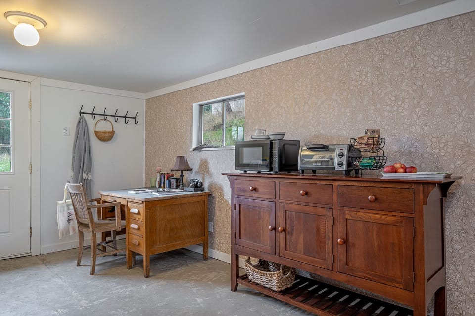 Multi-use space includes well-stocked butler's pantry, writing desk, and laundry