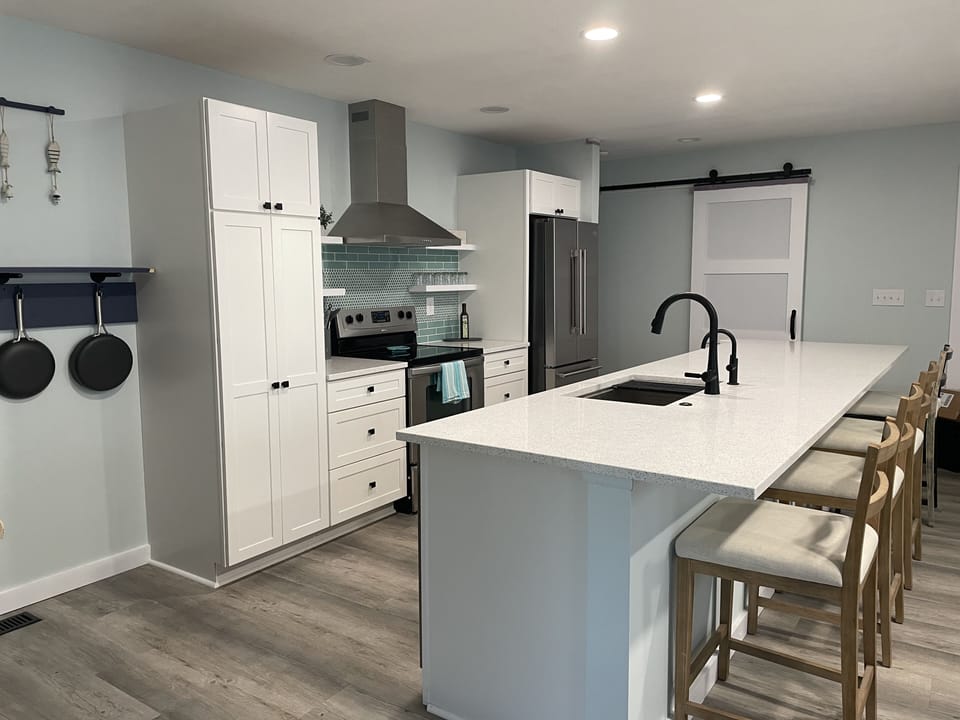Newly remodeled kitchen all cookware at arm's reach.