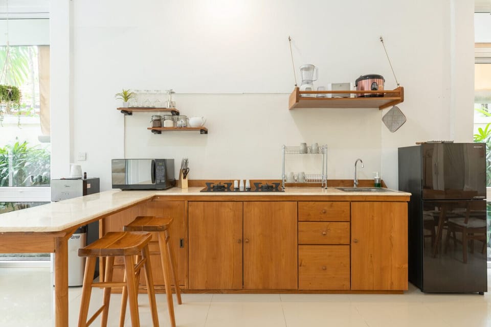 Spacious kitchenette with modern appliances and ample counter space