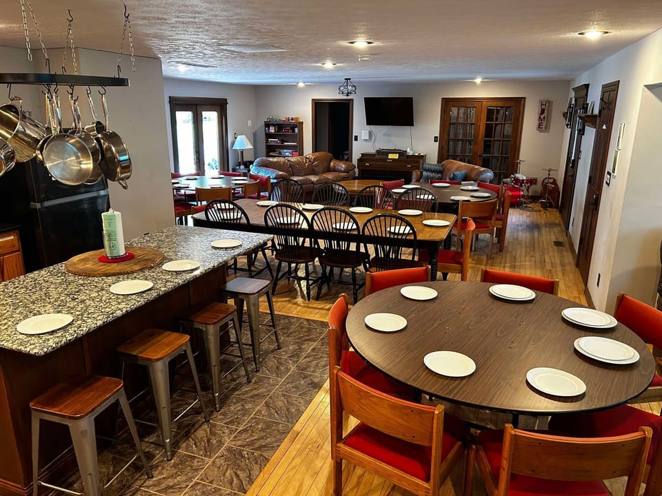 Dining Hall set up.  The tables, chairs , dishes and flatware are all available in the house.