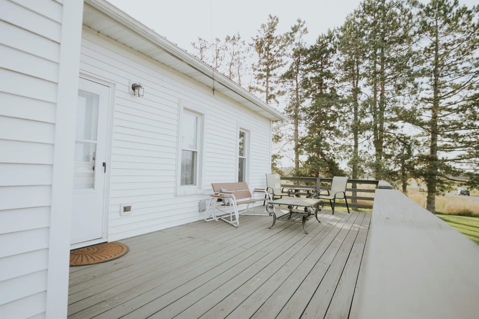 Enjoy sunrises, sunsets, and meals from the porch! 