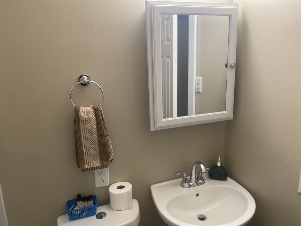 Bathroom, Lotion, shampoo, conditioner, toothbrush, floss.