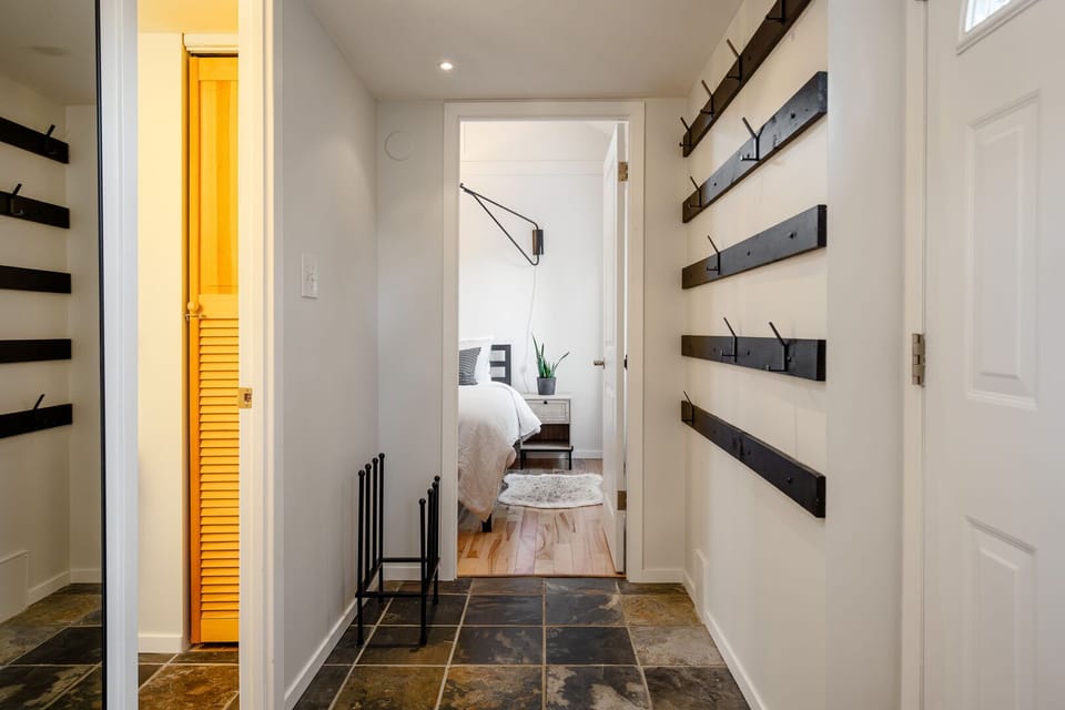 Mudroom entry with ski storage racks