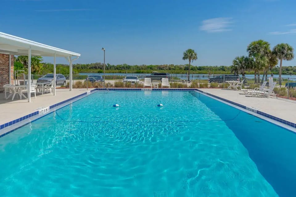 Enjoy the heated community pool!  its open til dusk all year round 
