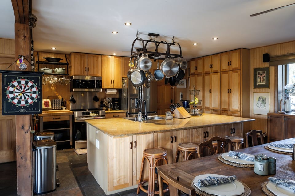This kitchen is what chefs dream about! It has everything you could possibly need for cooking throughout each day of your trip. There is also a grill and solo stove pizza oven available for guest use.