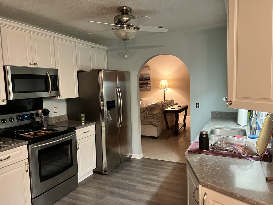 kitchen arched door leading to living area