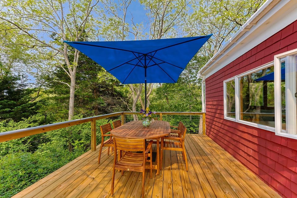 Sit back and relax on the brand new deck that boasts an outdoor dining table 