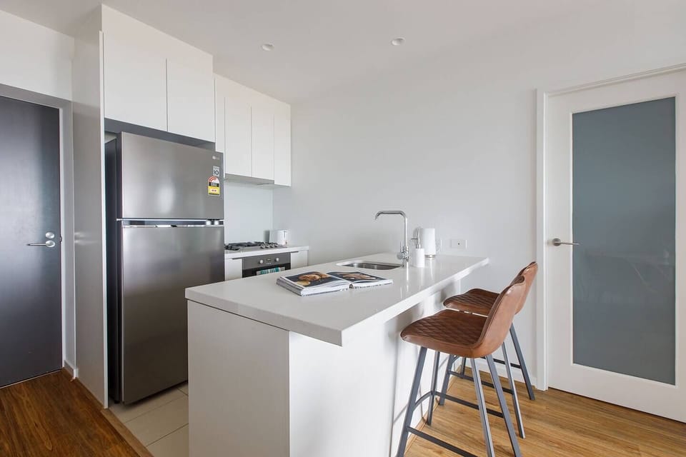 When you’re not enjoying the fabulous restaurant scene, enjoy cooking at home with this sleek kitchen providing everything you need.  
