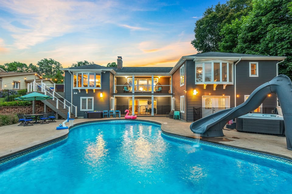 Your beautiful oasis to cool off & play with the kids on hot summer days. The slide will be a huge hit with kids and adults alike! You can even eat lunch next to the pool.