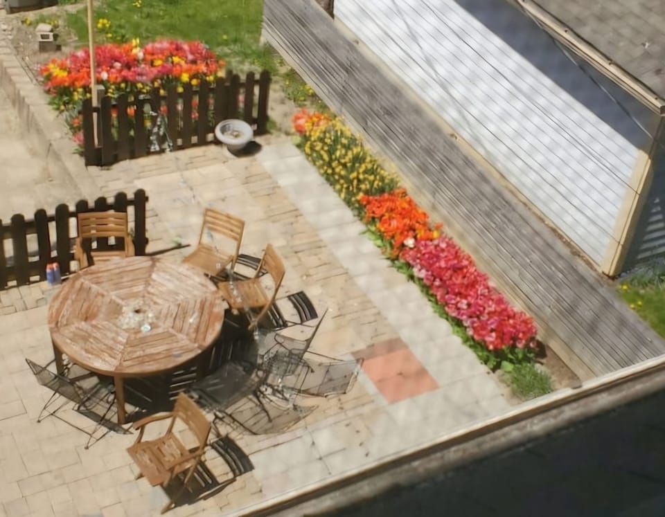 Back/patio with grill, one designated parking spot