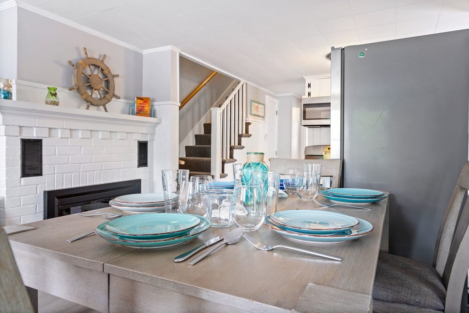 Sunlit dining for 6: where good food and great company meet serene vistas.