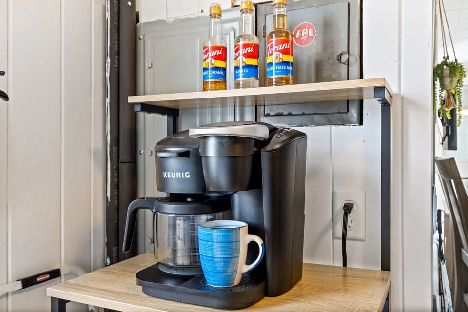 Sip, Savor, Relax! Our coffee machine and complimentary coffee box.