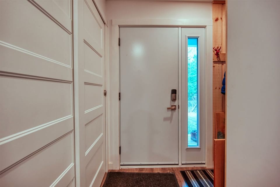 Entrance and mud room with ski storage.