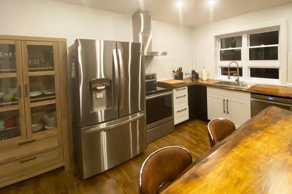 Fully stocked kitchen with peninsula.