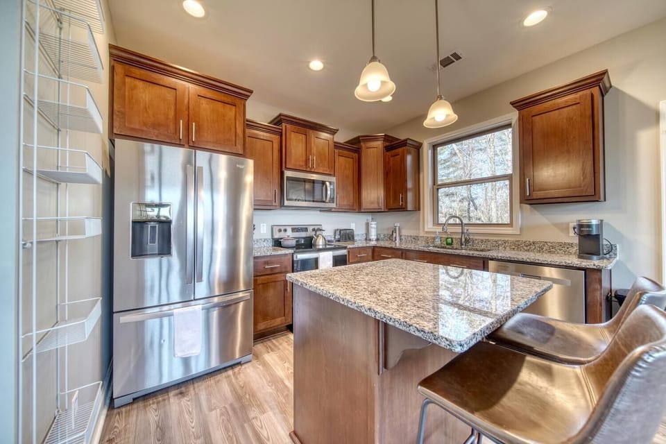 Escape to your dream vacation home with a stunning and modern kitchen