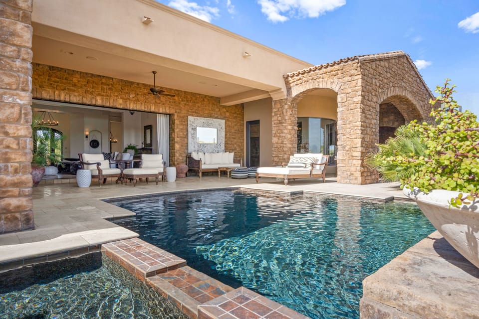 Pool and Hot Tub just a few steps from the great room and the 1st Master bedroom