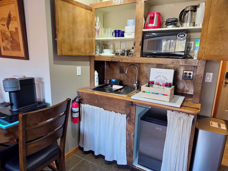 Microwave, mini fridge, toaster, french press, coffee grinder, tea kettle....