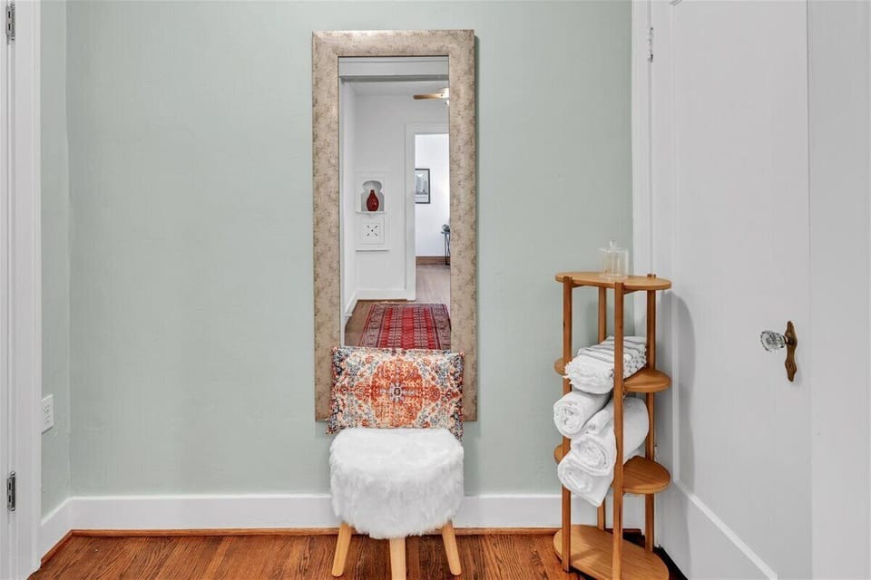 Additional area outside bathroom for getting ready and additional storage.