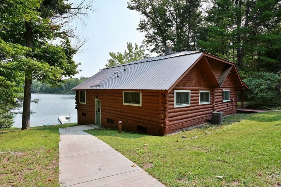 Sloped walk down to the side entry.