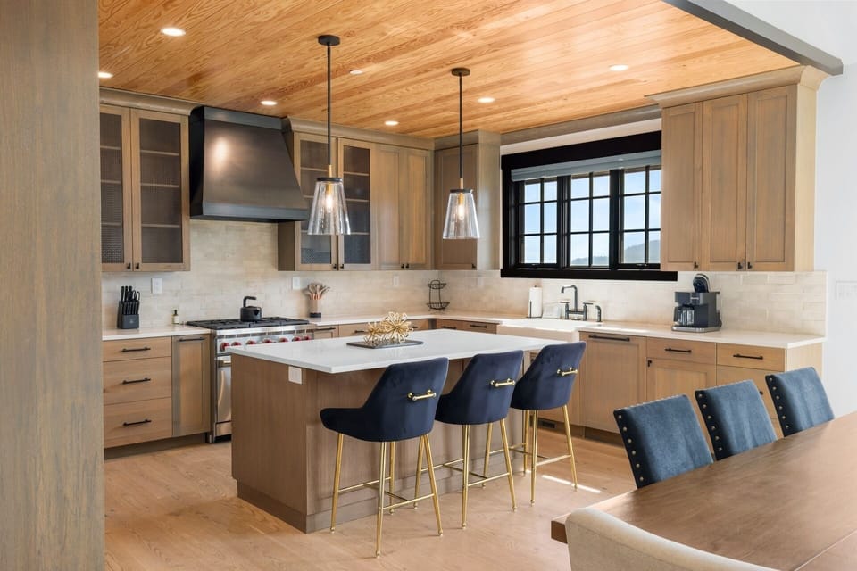 Cook your favorite meals in this beautifully designed kitchen, where warm wood tones and modern fixtures create the perfect space for your culinary adventures.